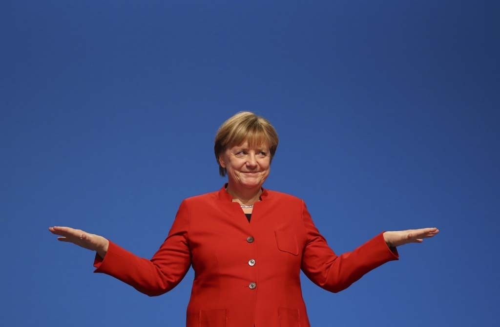 Bà Merkel trung thành với kiểu tóc ngắn mái bằng suốt hàng chục năm. Bà từng cho biết, bà không bảo thủ song mái tóc ngắn, mái bằng là kiểu tóc giúp bà thấy thoải mái và hợp nhất (Ảnh: Reuters)
