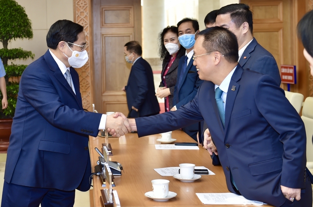 Thủ tướng Chính phủ Phạm Minh Chính gặp gỡ các doanh nhân nhân Ngày Doanh nhân Việt Nam 13/10 tại Hà Nội. (Ảnh: VGP)