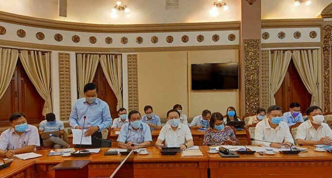 Từ 16-3: Ra v&agrave;o Trụ sở UBND TP HCM phải đeo khẩu trang, tổ chức họp kh&ocirc;ng qu&aacute; 50 người - Ảnh 1.