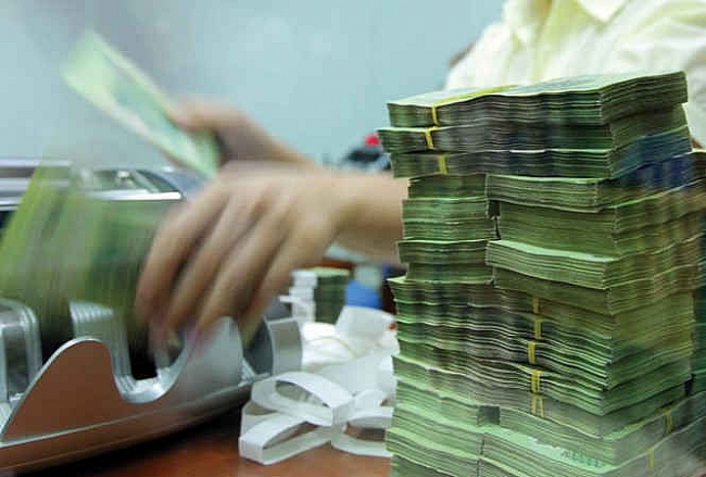 Ngân hàng cơ cấu lại nợ để chặn nợ xấu