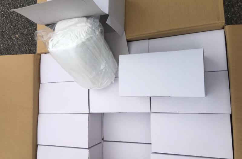 Tạm giữ hơn 200.000 khẩu trang không nhãn mác - 1