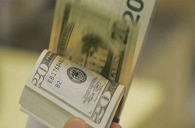 Tỷ giá tháng 3: Hạ nhiệt 'sóng thần'