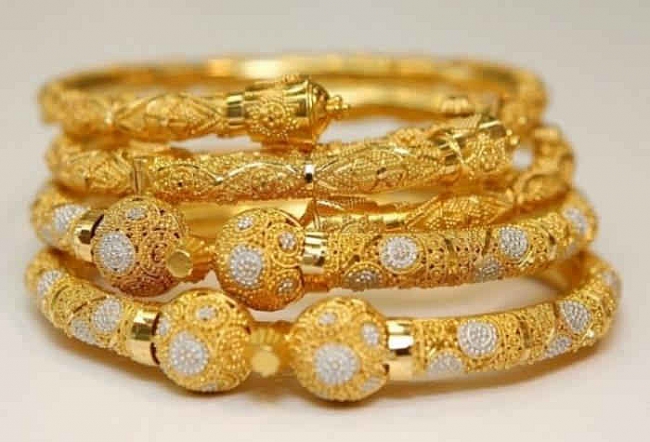 Dịch Covid - 19 lan rộng, giá vàng cuối tuần tăng nhẹ