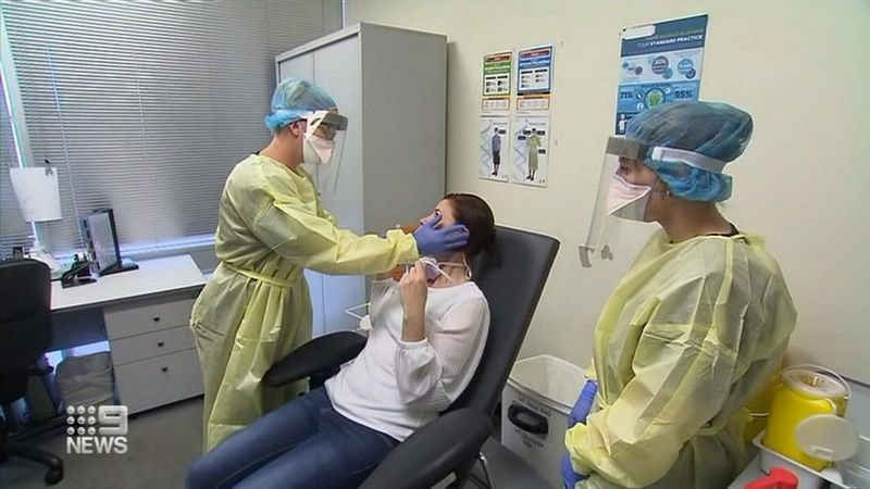 australia mo rong doi tuong xet nghiem de ngan chan covid-19 lay lan hinh 1