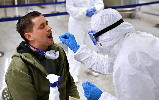 vaccine covid-19 cua nga co the se duoc san xuat hang loat vao thang 8 hinh 1