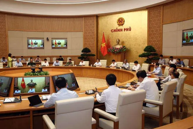 Chống COVID-19: Thống nhất mục tiêu kép, không đóng cửa với nước ngoài - 2