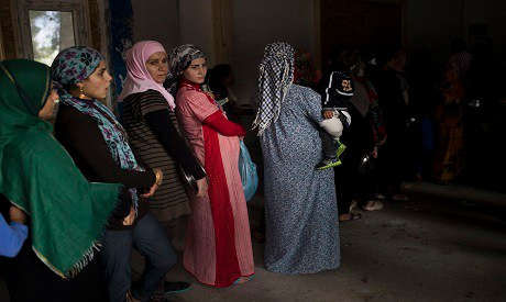 syria doi mat voi khung hoang nhan dao tram trong do covid-19 hinh 1