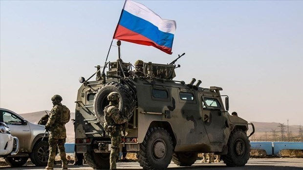 Xe boc thep cua Nga bi tan cong khi dang tuan tra tai Syria hinh anh 1
